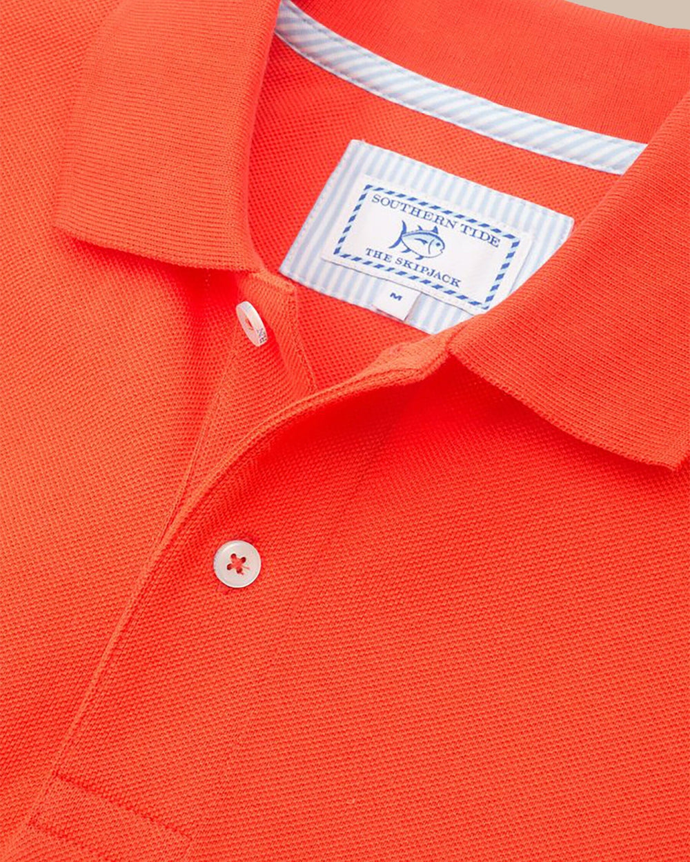 The detail view of the Florida Gators Pique Polo Shirt by Southern Tide - Endzone Orange