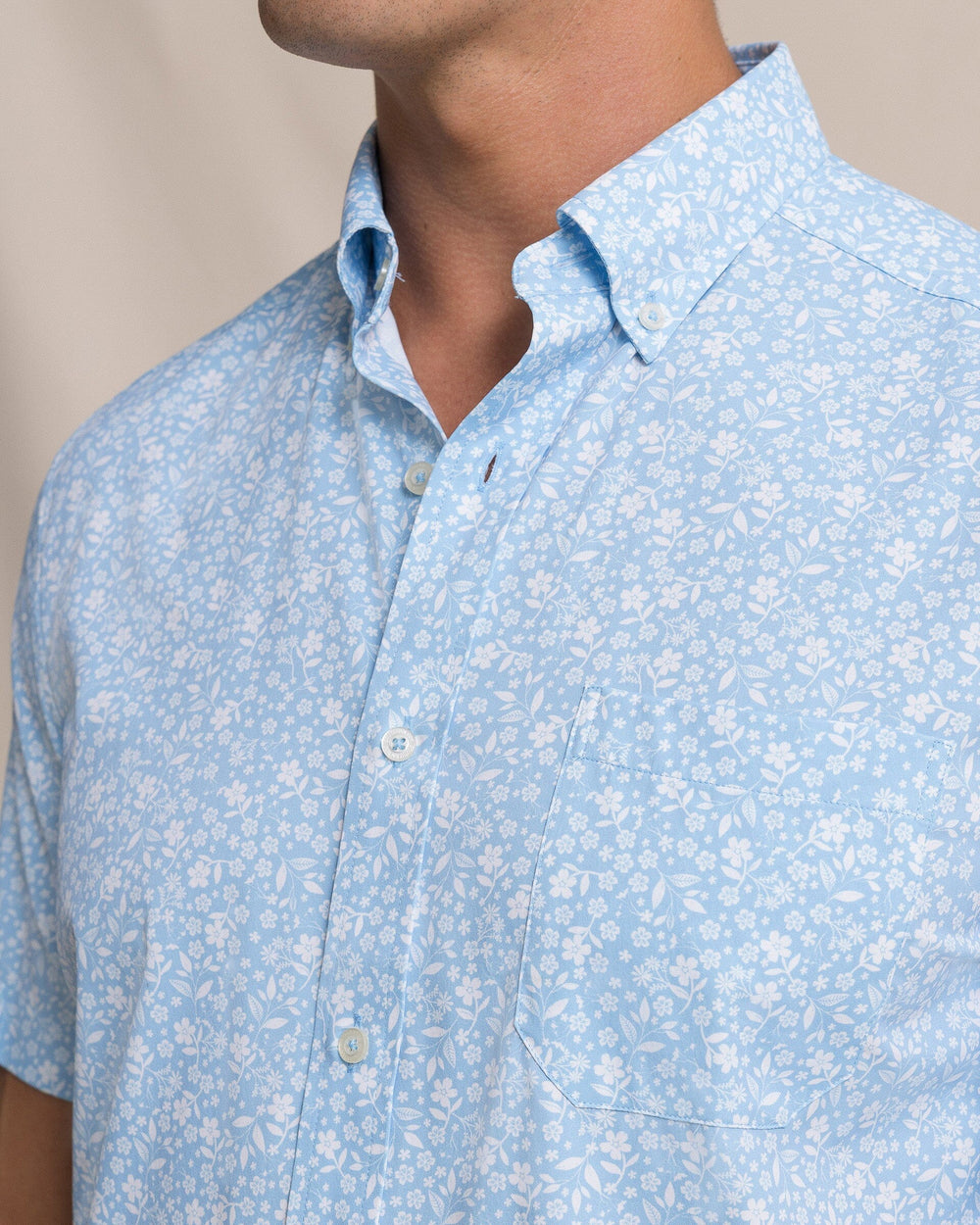The detail view of the Southern Tide Garden Blooms Coastal Breeze® Short Sleeve Sport Shirt by Southern Tide - Tide Blue