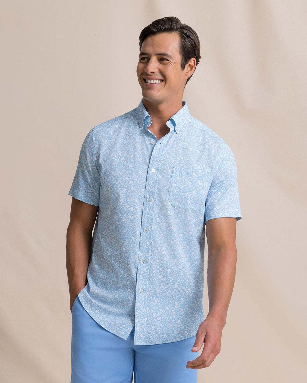 The front view of the Southern Tide Garden Blooms Coastal Breeze® Short Sleeve Sport Shirt by Southern Tide - Tide Blue