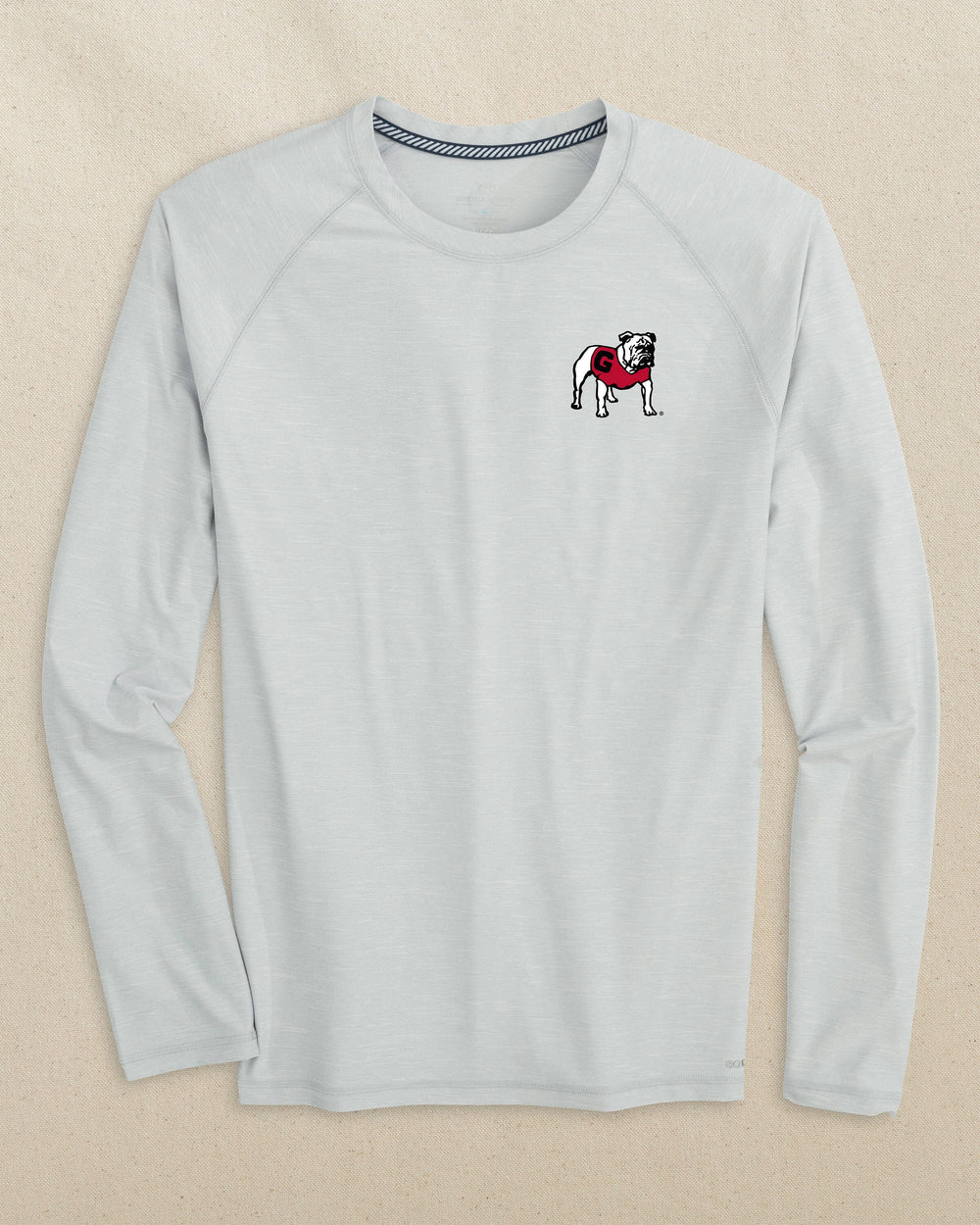 The front view of the Southern Tide Georgia Bulldogs brrr°®-illiant Performance Long Sleeve T-Shirt by Southern Tide - Platinum Grey