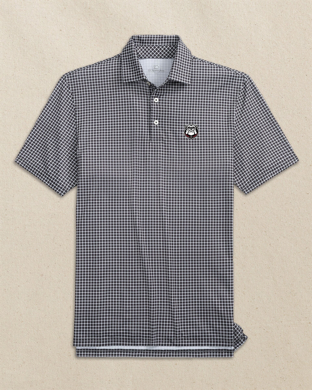 The front view of the Southern Tide Georgia Bulldogs Head Driver Dunes Edge Plaid Polo by Southern Tide - Black