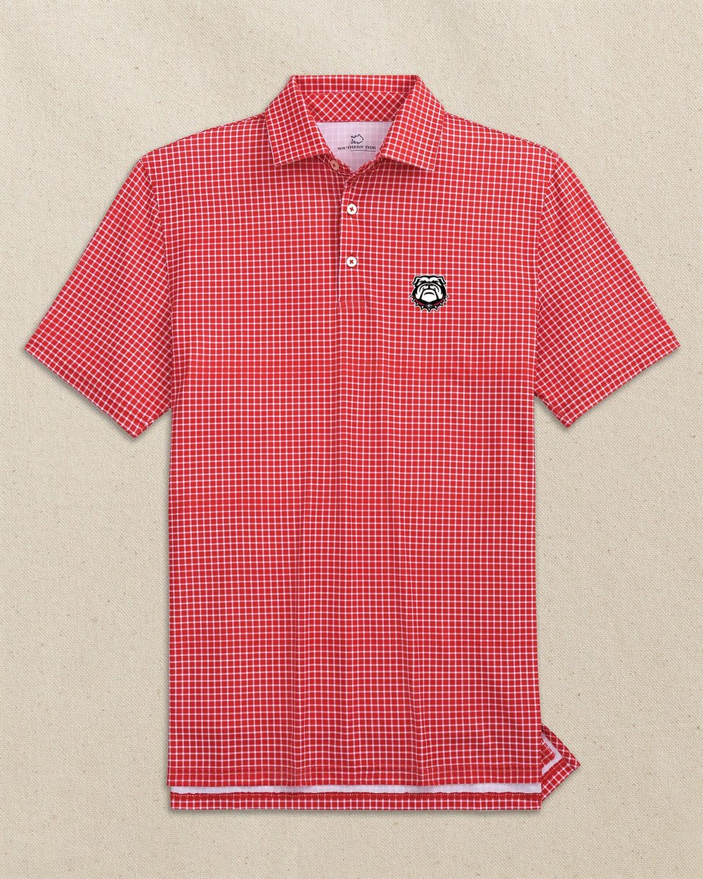The front view of the Southern Tide Georgia Bulldogs Head Driver Dunes Edge Plaid Polo by Southern Tide - Varsity Red