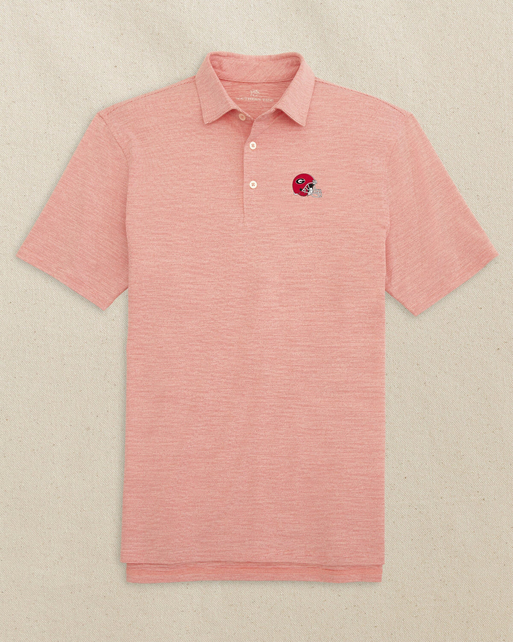 The front view of the Southern Tide Georgia Bulldogs Helmet Driver Spacedye Polo Shirt by Southern Tide - Varsity Red