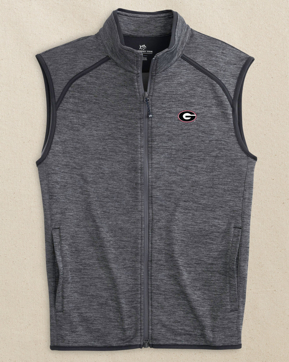 The front view of the Southern Tide Georgia Bulldogs Oval G Baybrook Heather Vest by Southern Tide - Heather Black