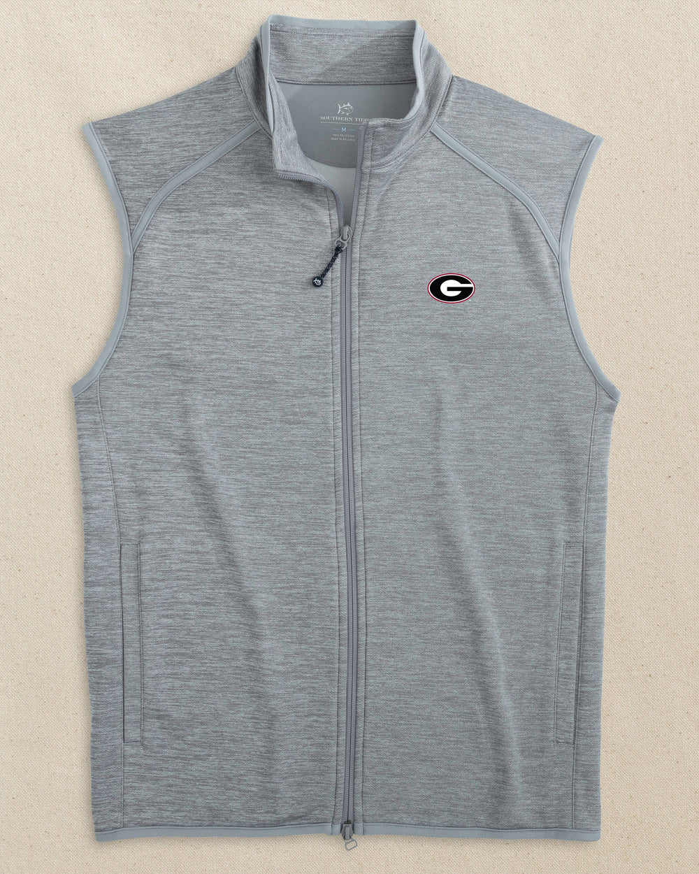 The front view of the Southern Tide Georgia Bulldogs Oval G Baybrook Heather Vest by Southern Tide - Heather Ultimate Grey