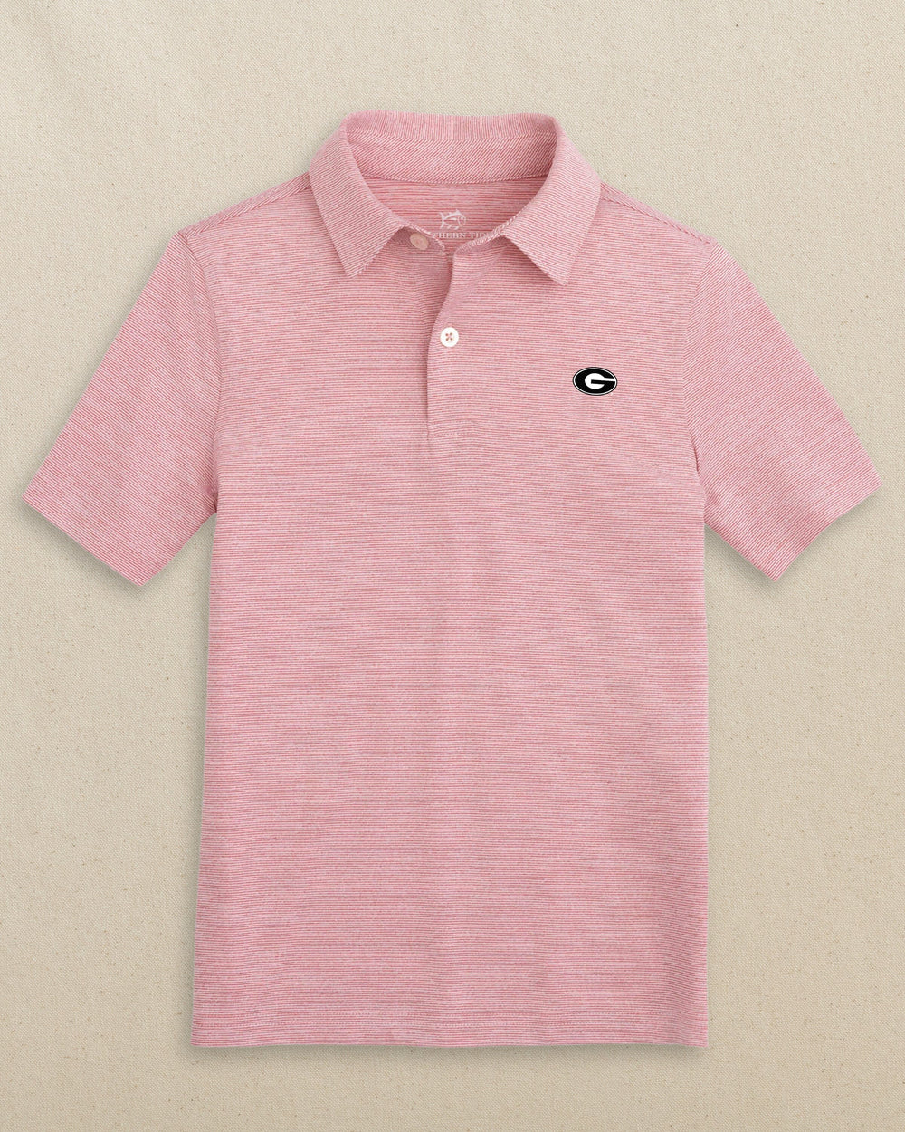 The front view of the Southern Tide Georgia Bulldogs Oval G Boys Driver Spacedye Polo Shirt by Southern Tide - Varsity Red