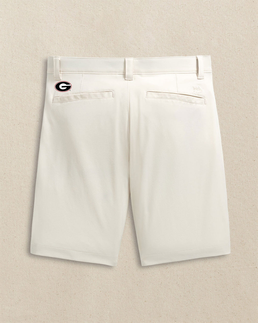 The back view of the Southern Tide Georgia Bulldogs Oval G brrr°®-die 8" Performance Short by Southern Tide - Stone