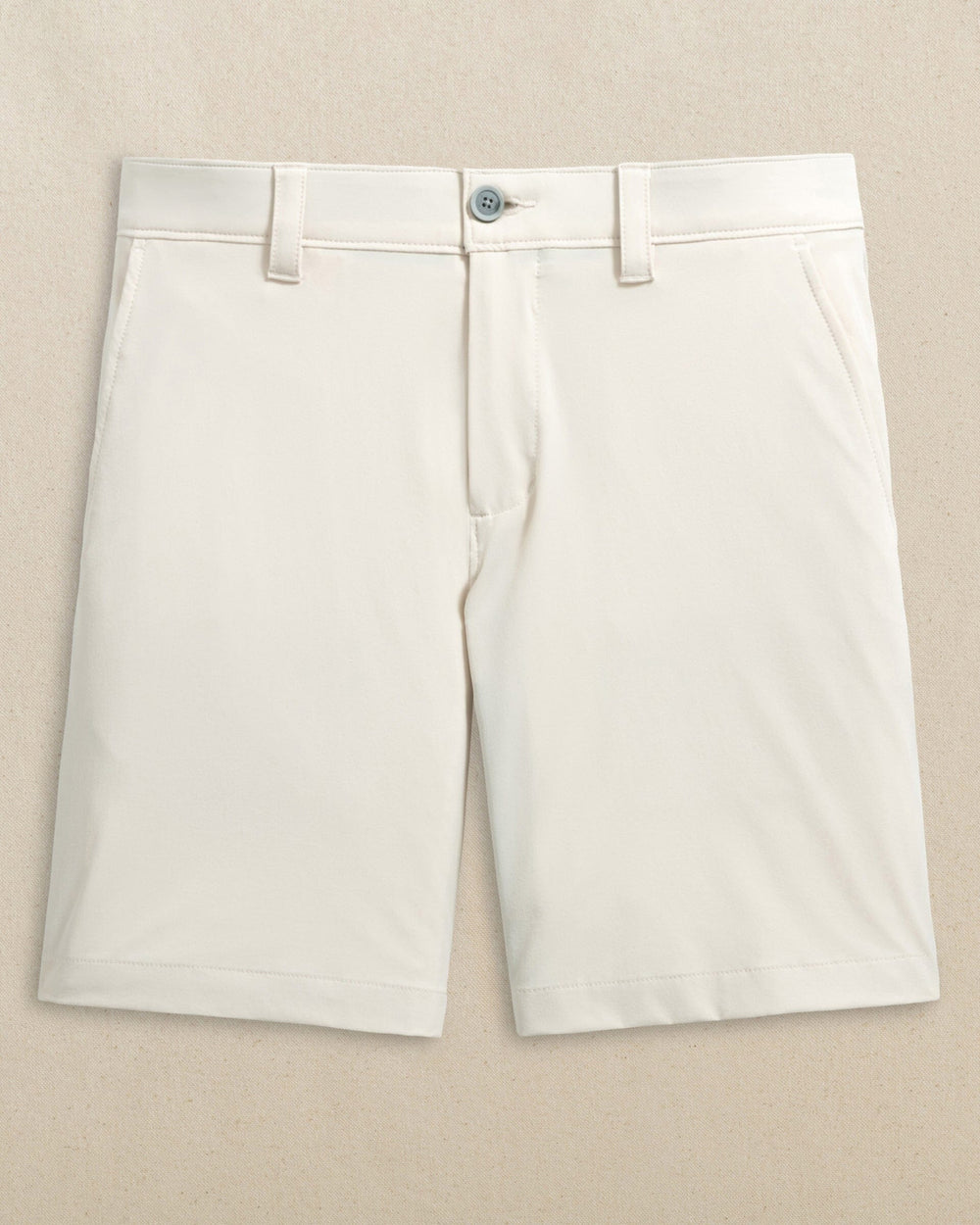 The front view of the Southern Tide Georgia Bulldogs Oval G brrr°®-die 8" Performance Short by Southern Tide - Stone