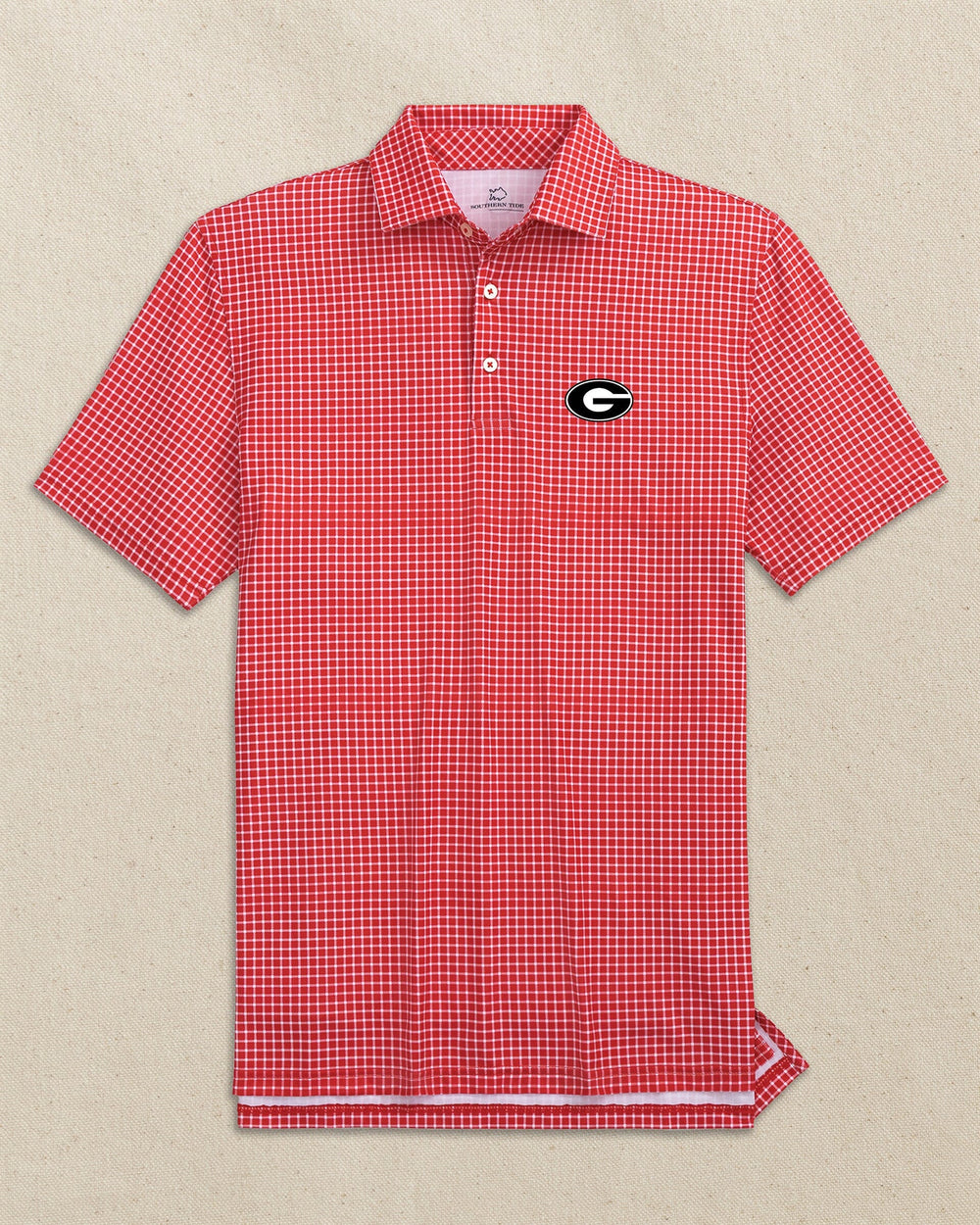 The front view of the Southern Tide Georgia Bulldogs Oval G Driver Dunes Edge Plaid Polo by Southern Tide - Varsity Red
