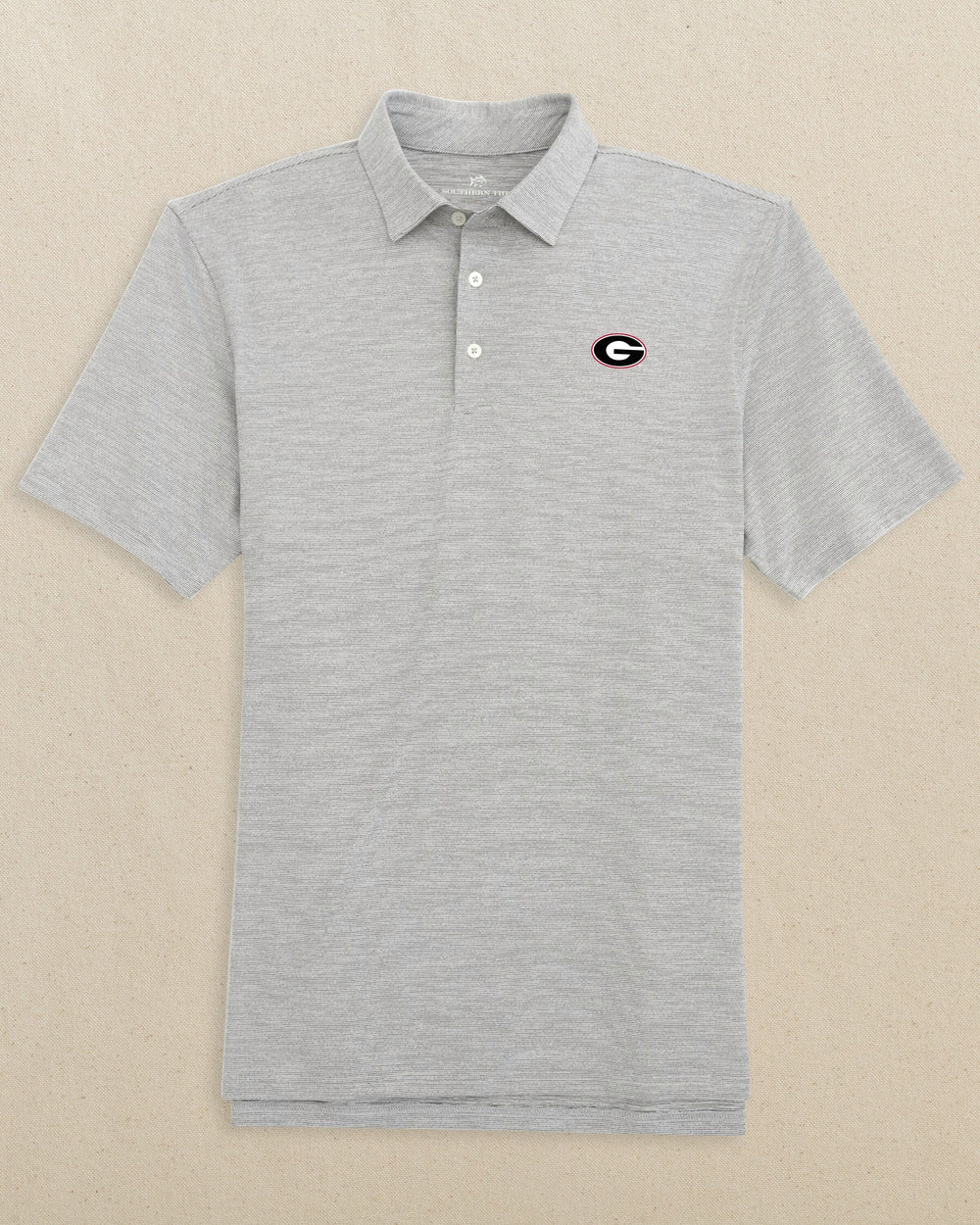 The front view of the Southern Tide Georgia Bulldogs Oval G Driver Spacedye Polo by Southern Tide - Black