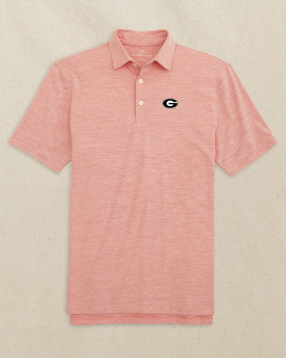 The front view of the Southern Tide Georgia Bulldogs Oval G Driver Spacedye Polo by Southern Tide - Varsity Red