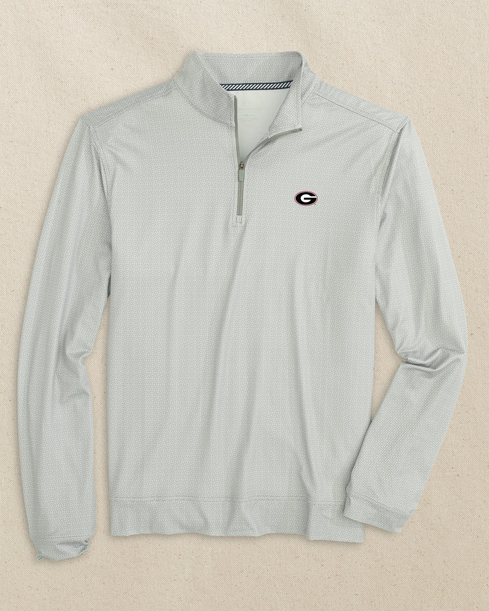 The front view of the Southern Tide Georgia Bulldogs Oval G Pine Ridge Print Cruiser Quarter Zip by Southern Tide - Steel Grey