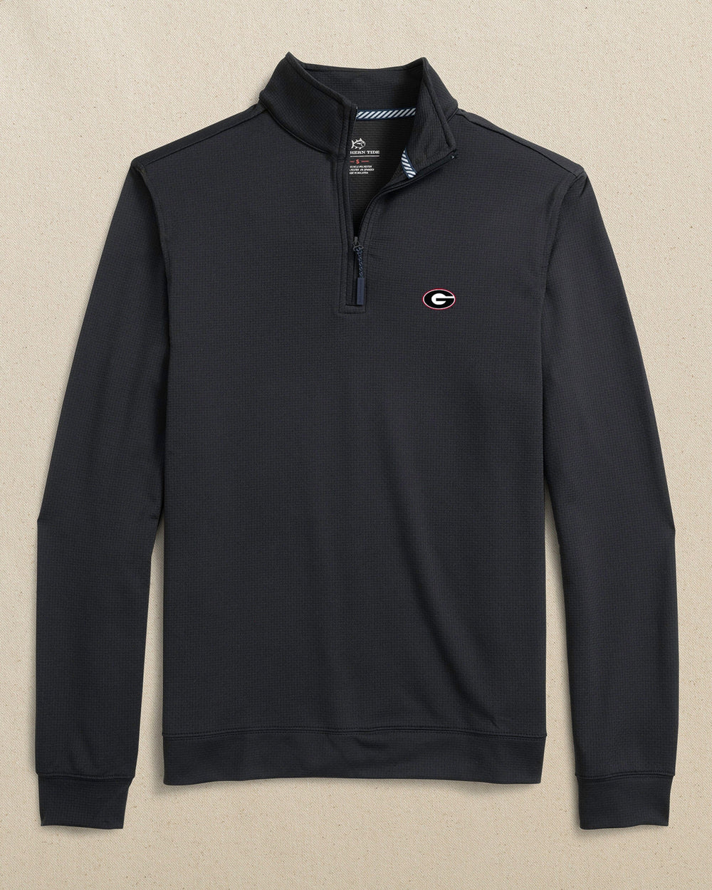 The front view of the Southern Tide Georgia Bulldogs Oval G Schooner Quarter Zip by Southern Tide - Caviar Black