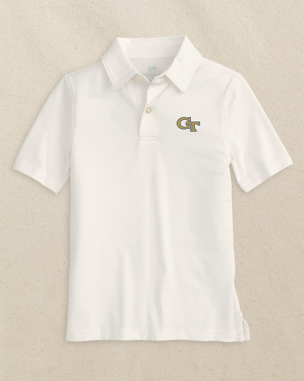 The front view of the Southern Tide Georgia Tech Boys Driver Performance Polo Shirt by Southern Tide - Classic White