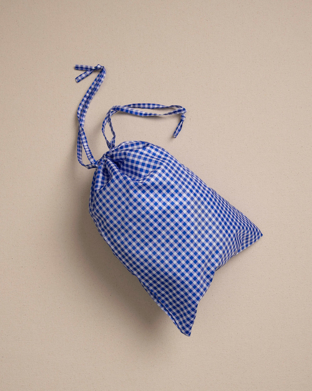 The bag view of the Southern Tide Gingham Packing Cubes 4-Piece Set by Southern Tide - Blue