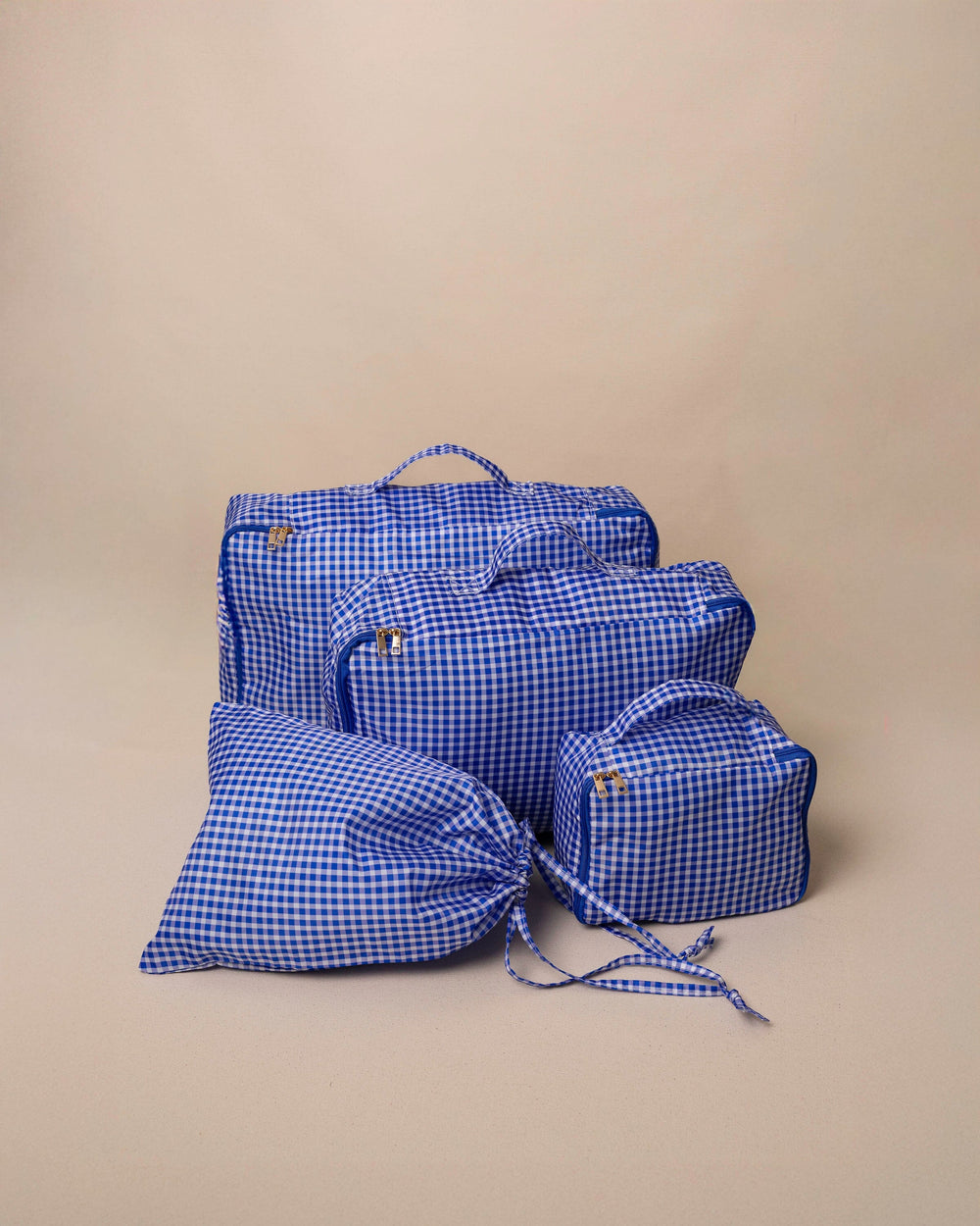 The set view of the Southern Tide Gingham Packing Cubes 4-Piece Set by Southern Tide - Blue