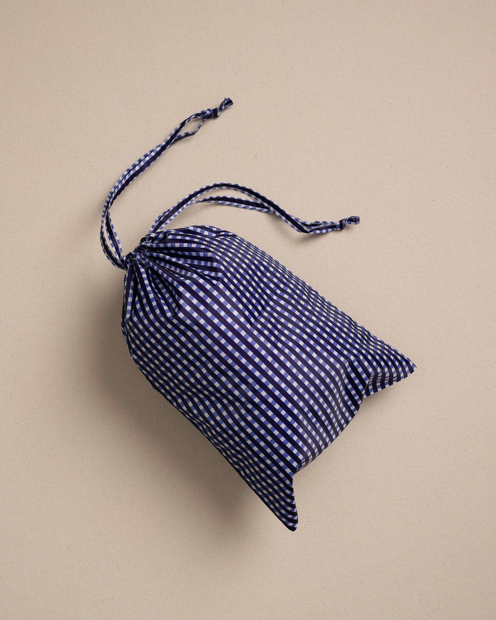 The bag view of the Southern Tide Gingham Packing Cubes 4-Piece Set by Southern Tide - Navy