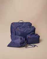 The set view of the Southern Tide Gingham Packing Cubes 4-Piece Set by Southern Tide - Navy