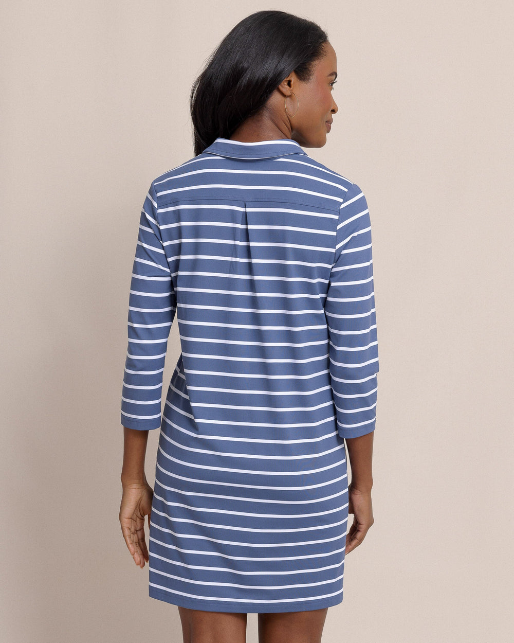 The back view of the Southern Tide Ginny Stripe Performance Dress by Southern Tide - Light Indigo 