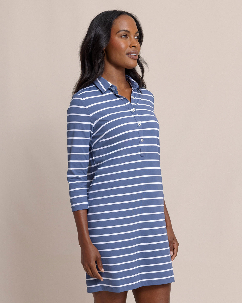 The side view of the Southern Tide Ginny Stripe Performance Dress by Southern Tide - Light Indigo 