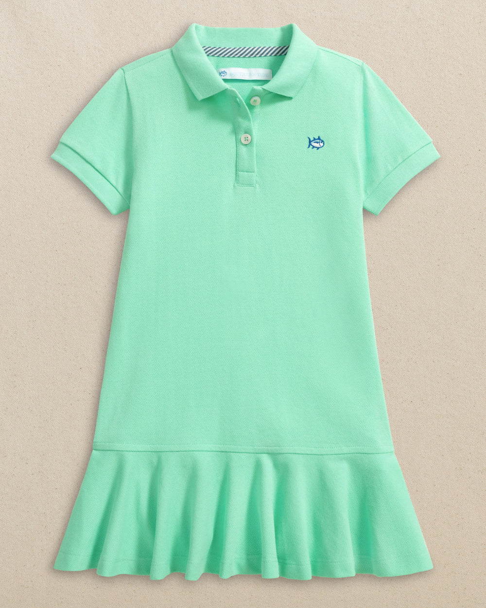 The front view of the Southern Tide Girls Skipjack Dropwaist Polo Dress by Southern Tide - Gulf Shores