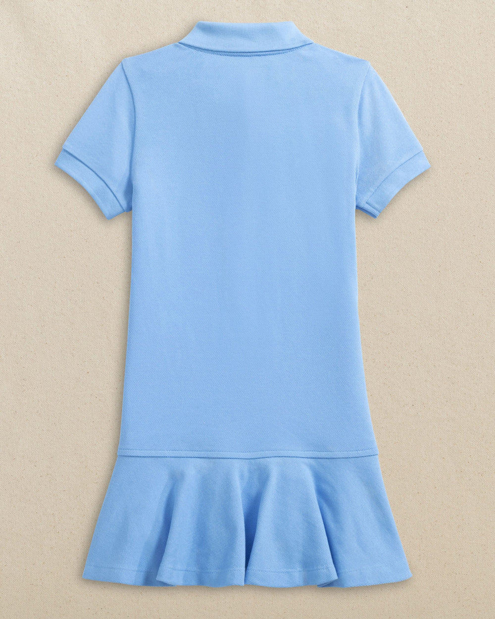 The back view of the Southern Tide Girls Skipjack Dropwaist Polo Dress by Southern Tide - Ocean Channel