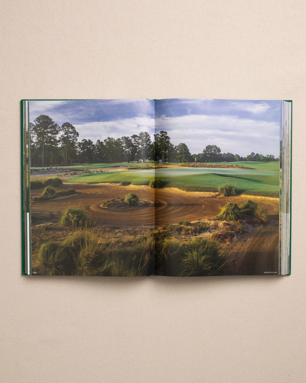 The detail view of the Johnny Vacay Golf Bum Book at Southern Tide - White