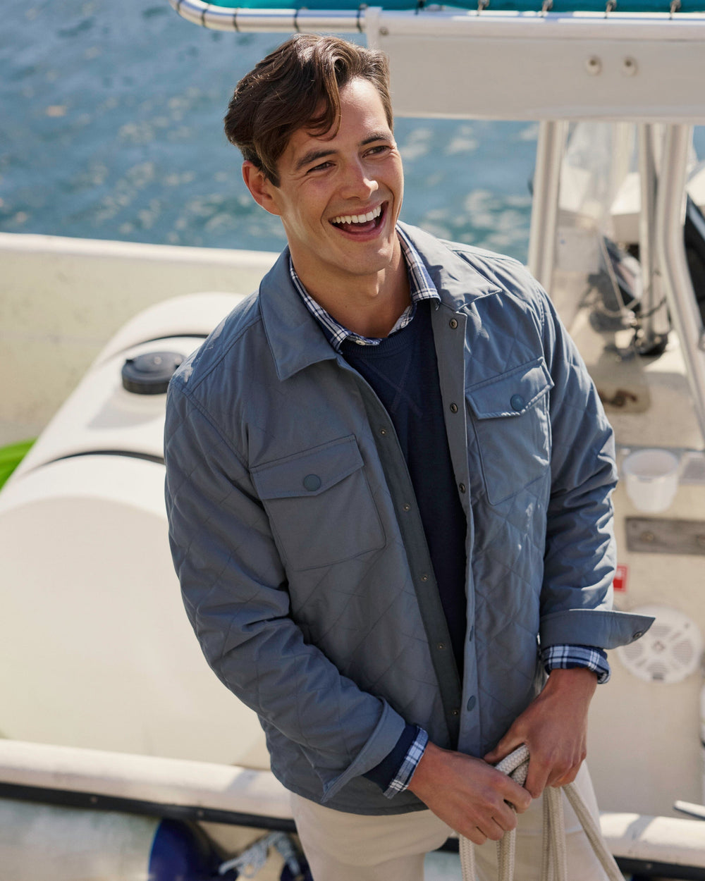 The lifestyle view of the Southern Tide Grafton Quilted Jacket by Southern Tide - Harbour Mist