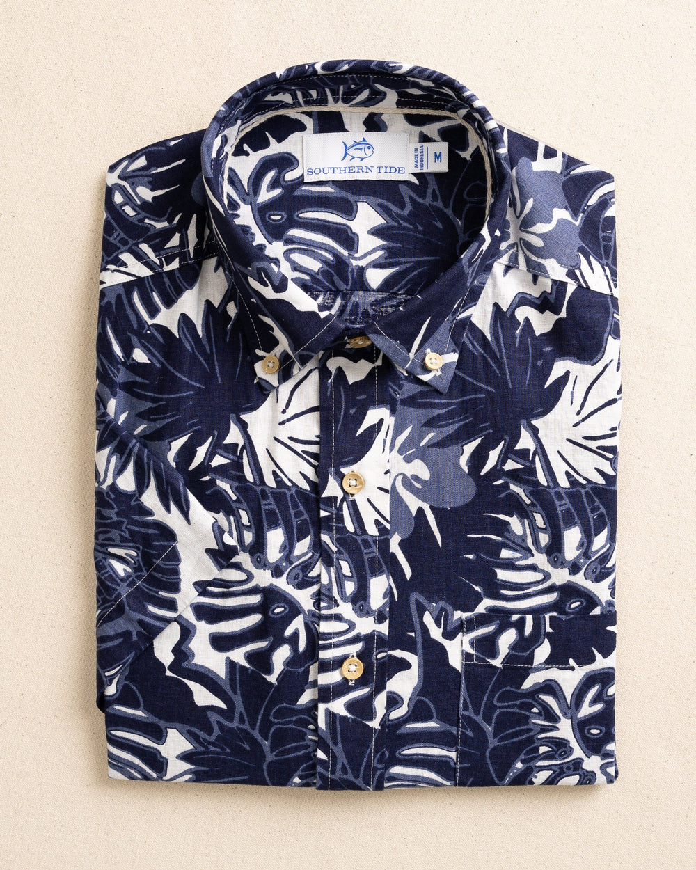 The front laydown view of the Southern Tide Grand Palms Linen Rayon Short Sleeve Sport Shirt by Southern Tide - Dress Blue