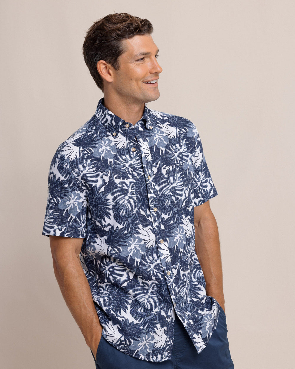 The side view of the Southern Tide Grand Palms Linen Rayon Short Sleeve Sport Shirt by Southern Tide - Dress Blue