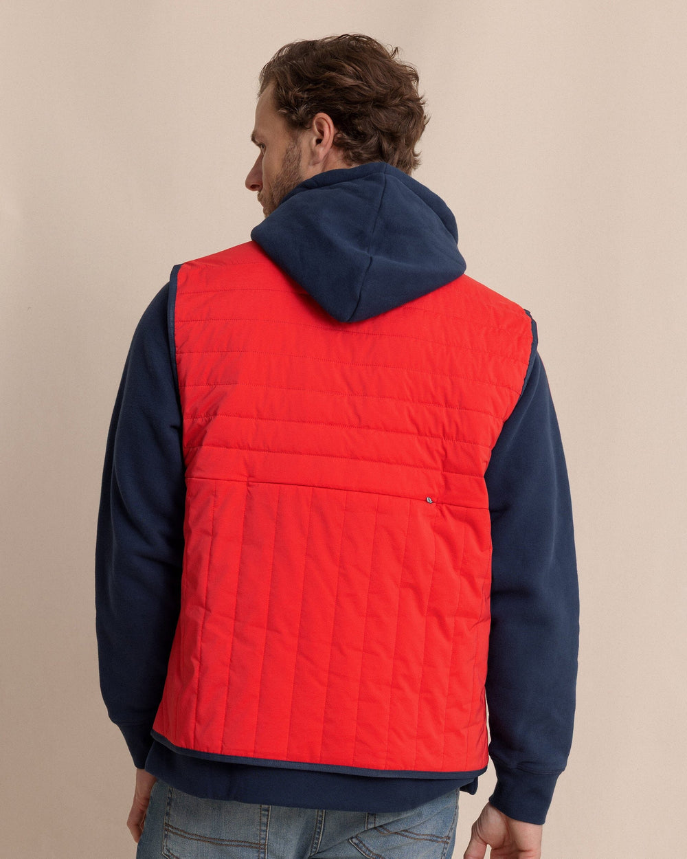 The back view of the Southern Tide Greenwood Packable Quilted Vest by Southern Tide - Crab Red