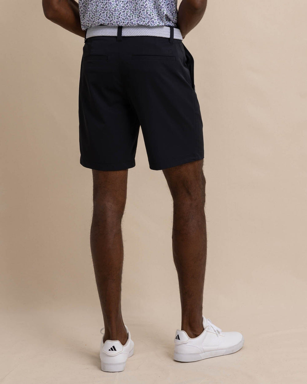 The back view of the Southern Tide gulf-8-inch-brrr-die-performance-short by Southern Tide - Caviar Black