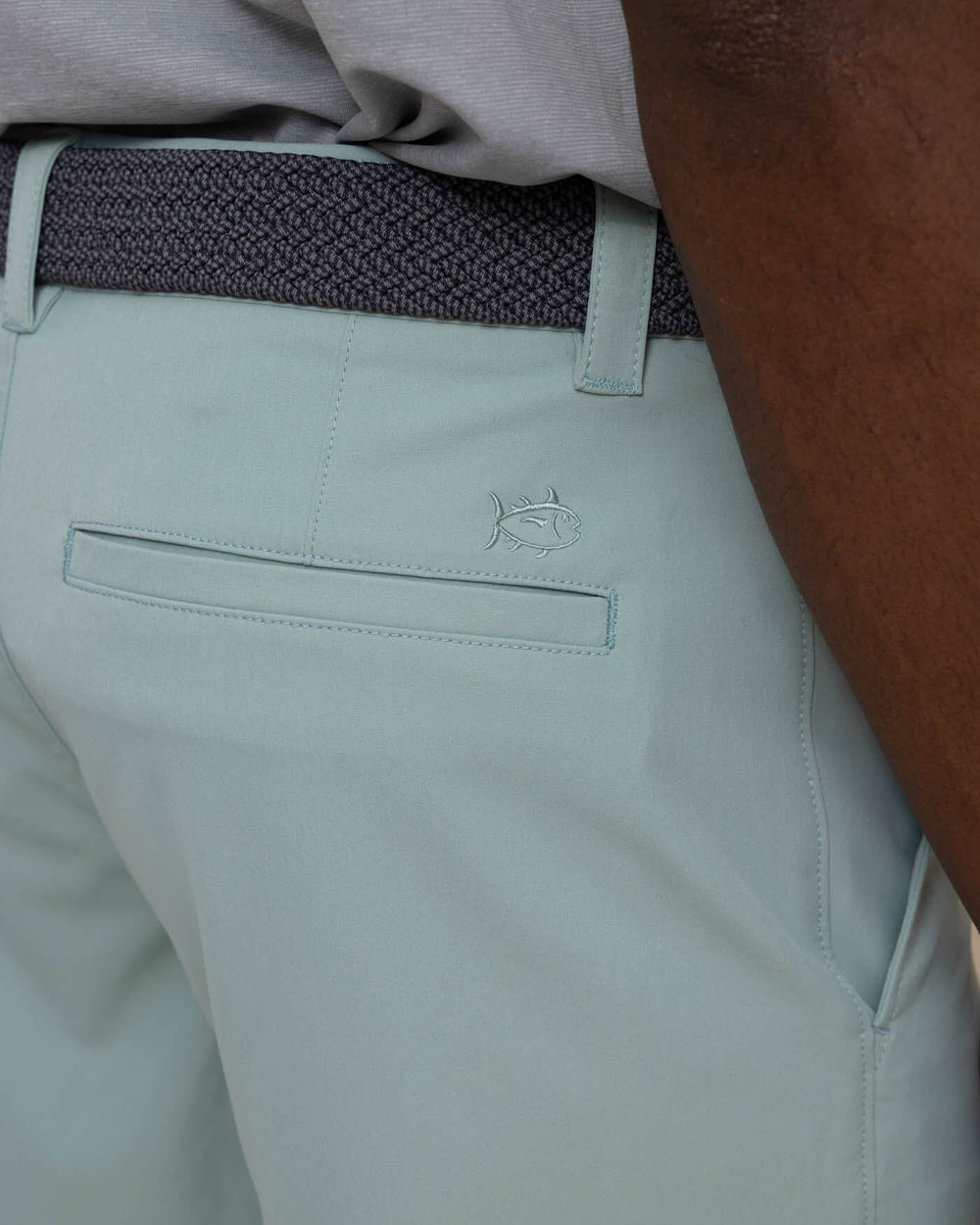 The detail view of the Southern Tide gulf 8 inch brrr die performance short by Southern Tide - Green Surf