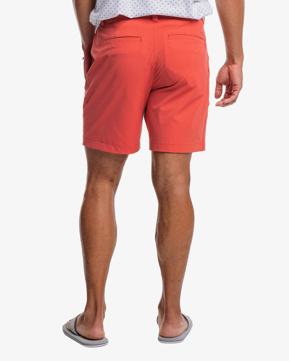 The back view of the Southern Tide brrr°®-die 8 Inch Performance Short by Southern Tide - Mineral Red