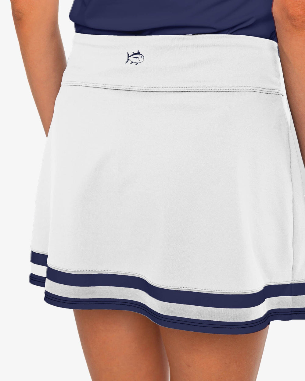 The back view of the Southern Tide Gwen Pleated Performance Skort by Southern Tide - Classic White