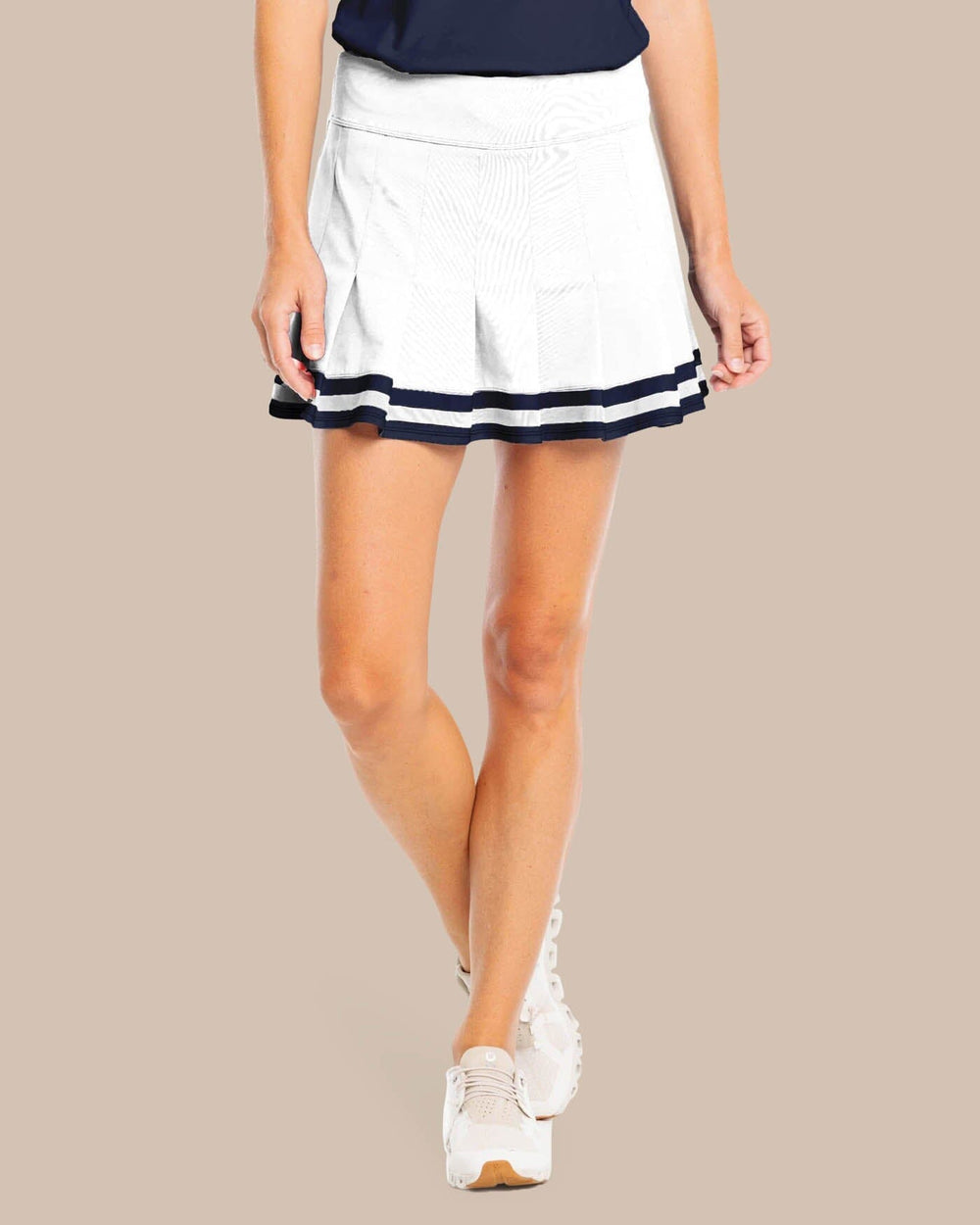 The front view of the Southern Tide Gwen Pleated Performance Skort by Southern Tide - Classic White