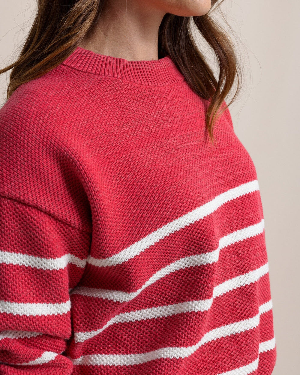 The detail view of the Southern Tide Haisley Stripe Crew Neck Sweater by Southern Tide - Raspberry Wine