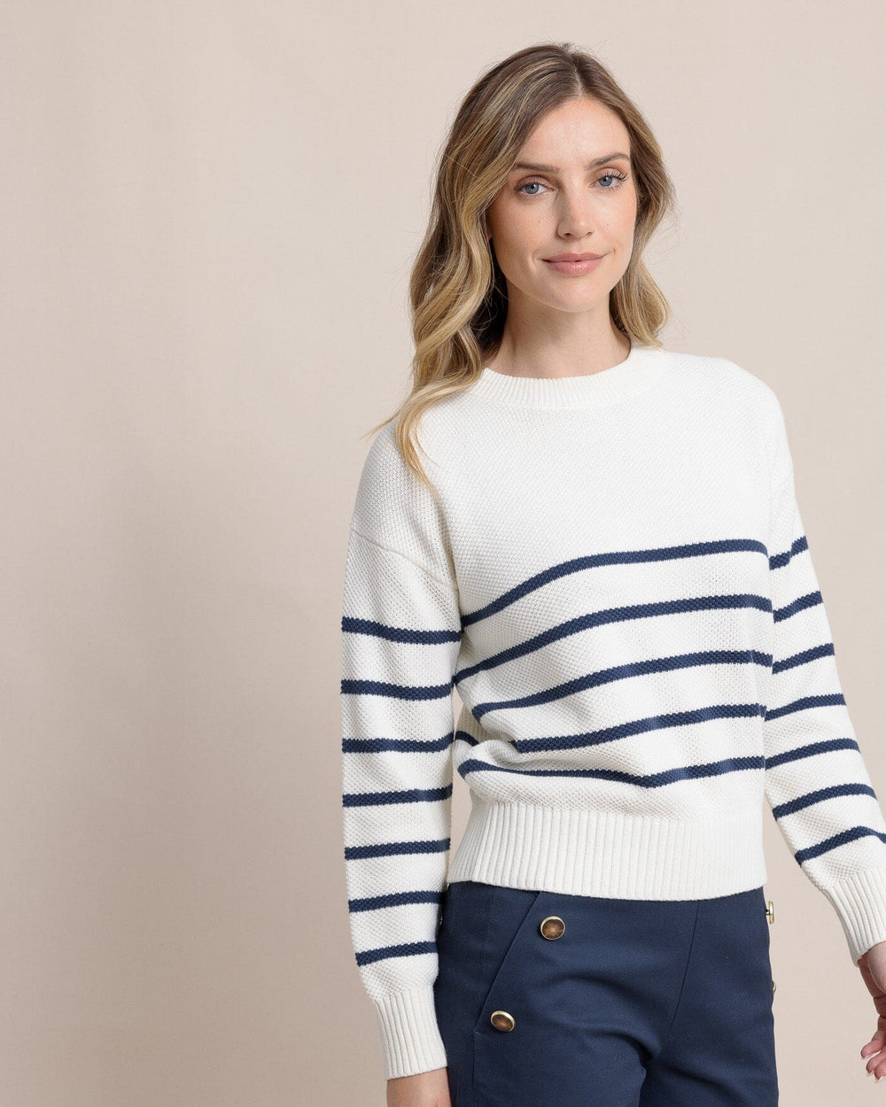 The side view of the Southern Tide Haisley Stripe Crew Neck Sweater by Southern Tide - Sand White