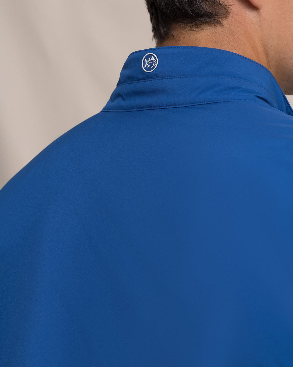 The detail view of the Southern Tide Harbor Reversible Vest by Southern Tide - Nautical Blue