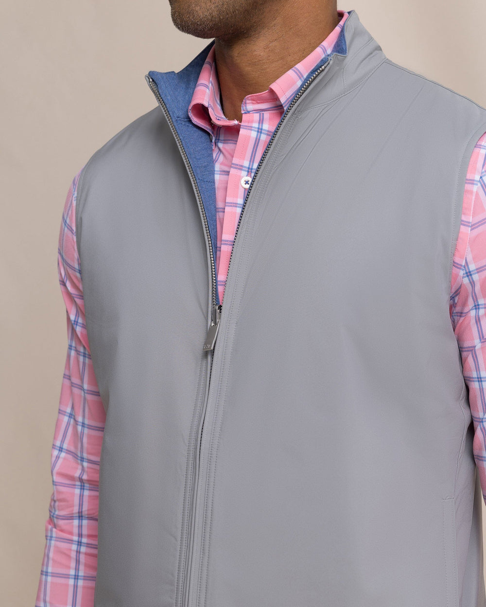 The detail view of the Southern Tide Harbor Reversible Vest by Southern Tide - Steel