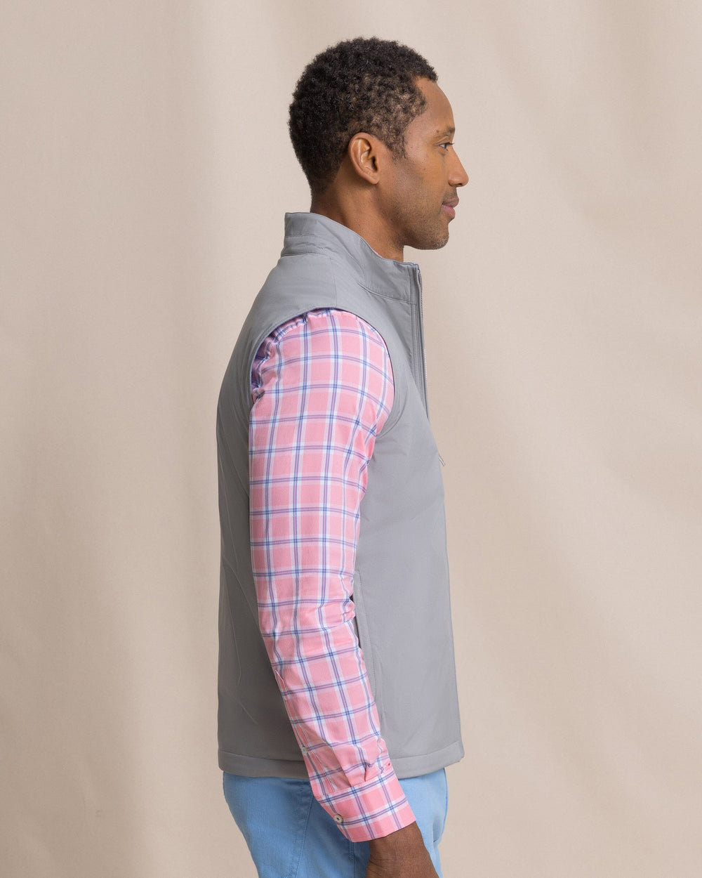 The side view of the Southern Tide Harbor Reversible Vest by Southern Tide - Steel