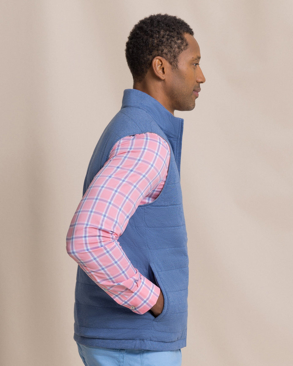 The side view of the Southern Tide Harbor Reversible Vest by Southern Tide - Steel