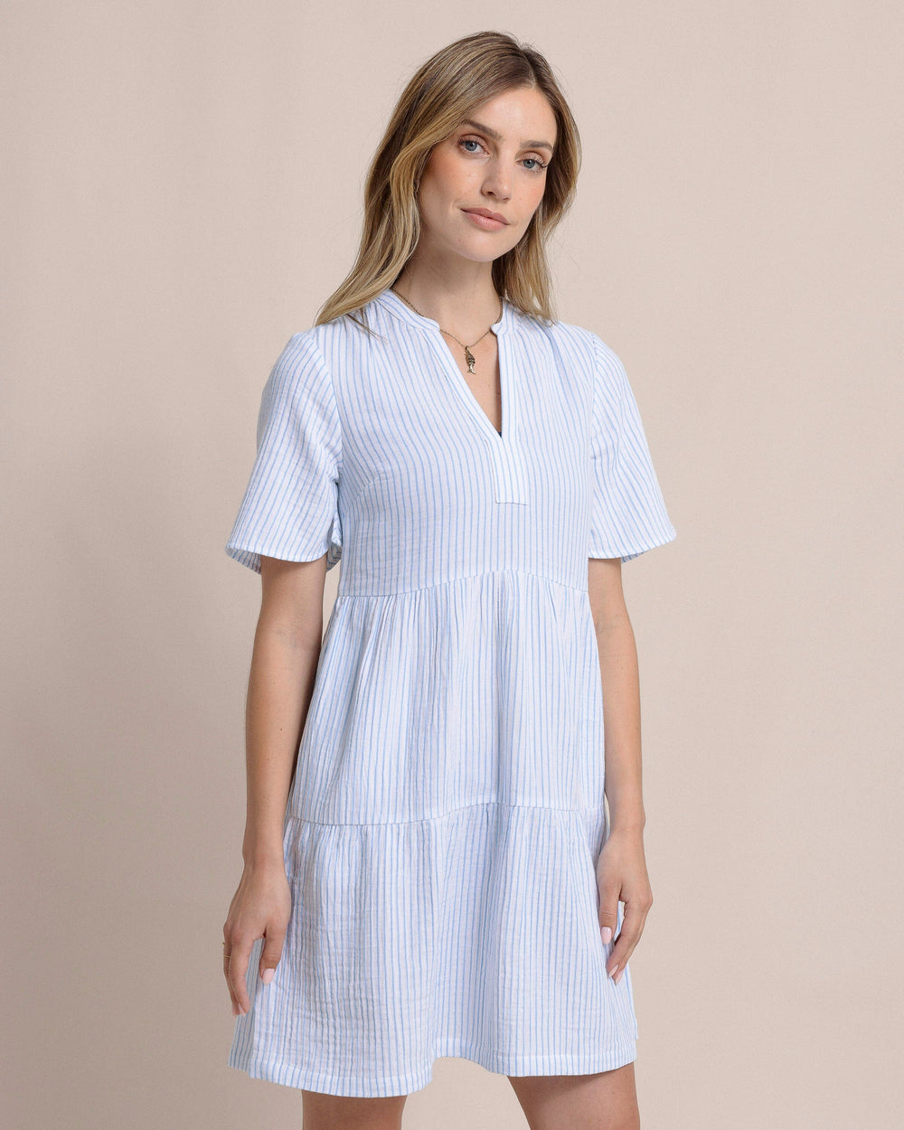 The side view of the Southern Tide Harper Short Sleeve Stripe Dress by Southern Tide - Boat Blue
