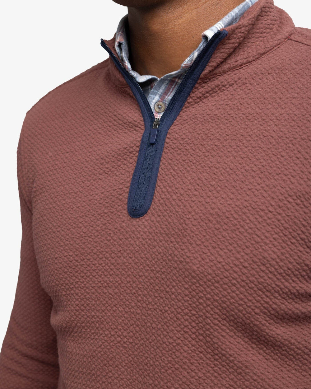 The detail view of the Southern Tide Heather Outbound Quarter Zip by Southern Tide - Heather Bordeaux Red