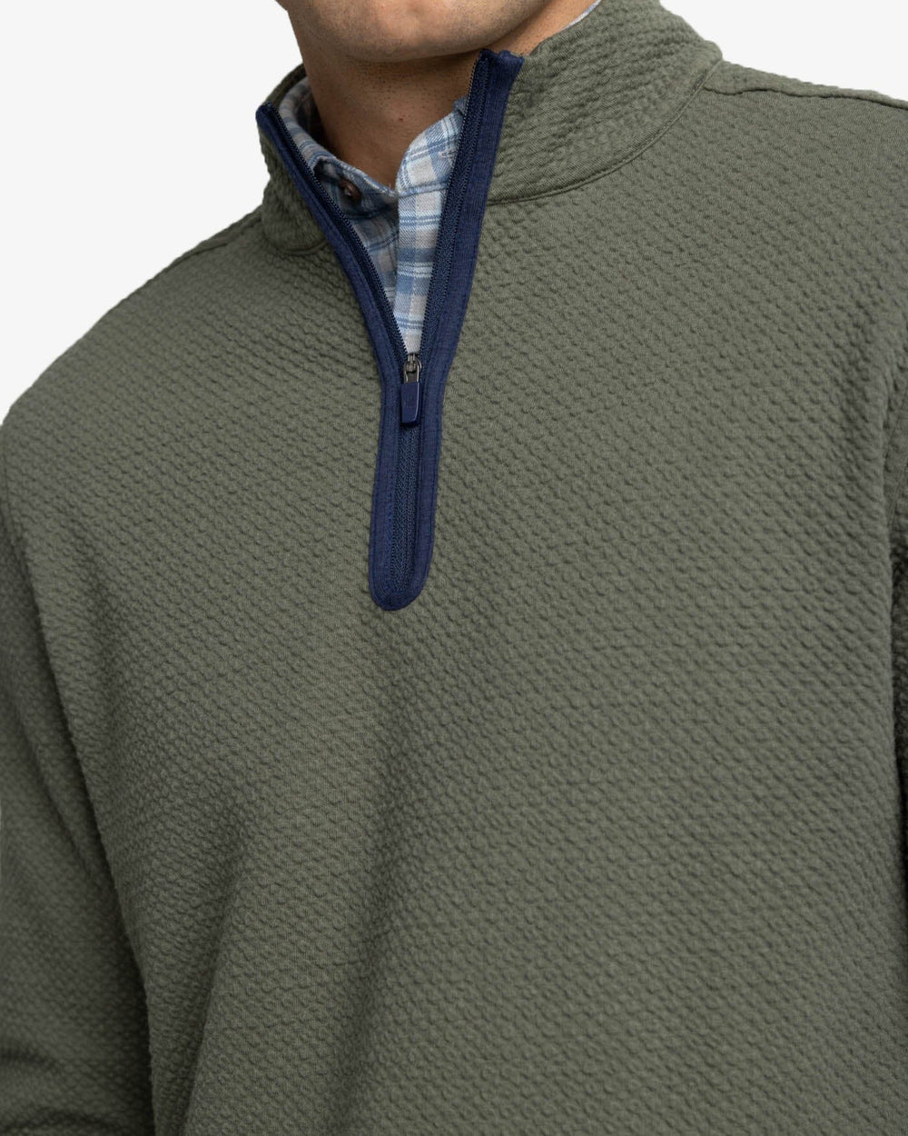 The detail view of the Southern Tide Heather Outbound Quarter Zip by Southern Tide - Heather Gulf Green