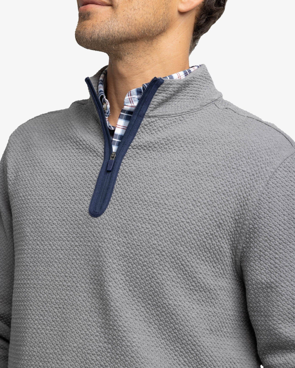 The detail view of the Southern Tide Heather Outbound Quarter Zip by Southern Tide - Heather Shadow Grey