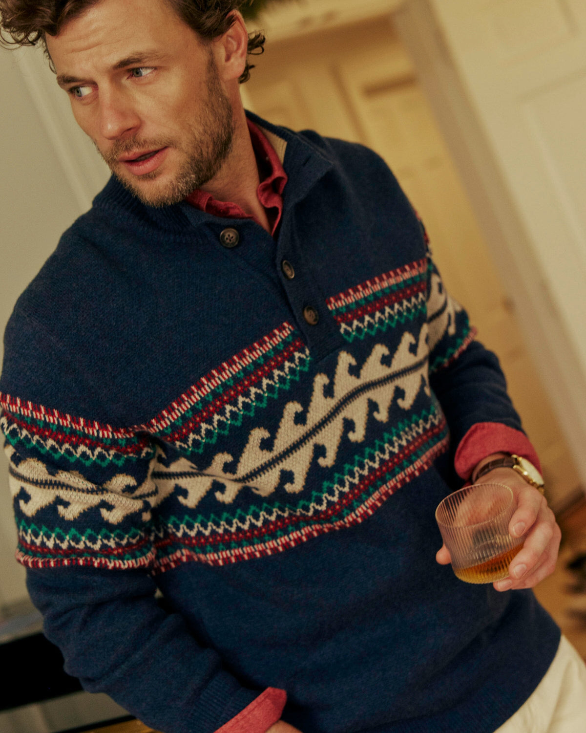 The lifestyle view of the Southern Tide Heather Quarter Button Fair Isle Sweater by Southern Tide - Heather Dress Blue