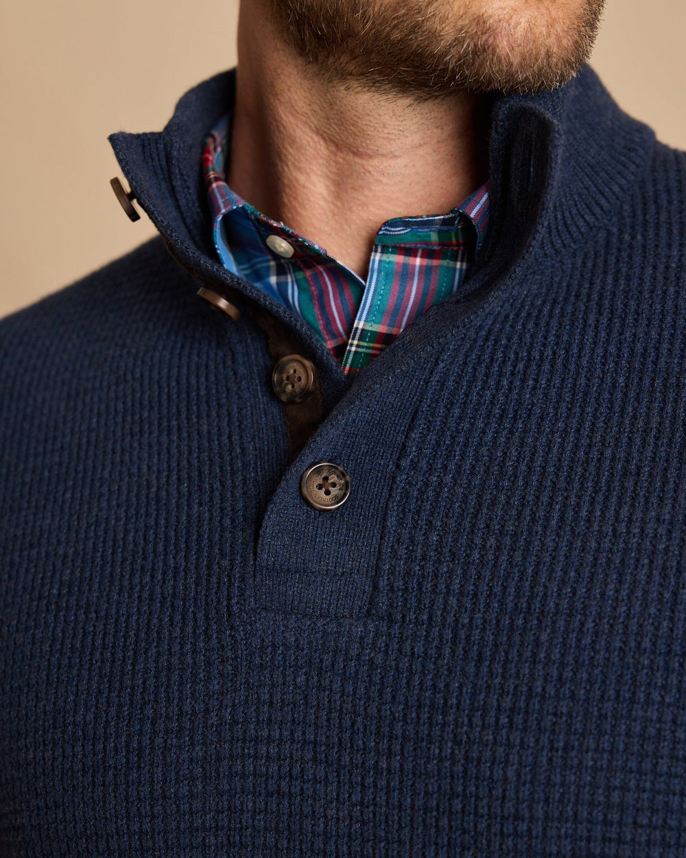 The detail view of the Southern Tide Heather Quarter Button Sweater by Southern Tide - Heather Dress Blue