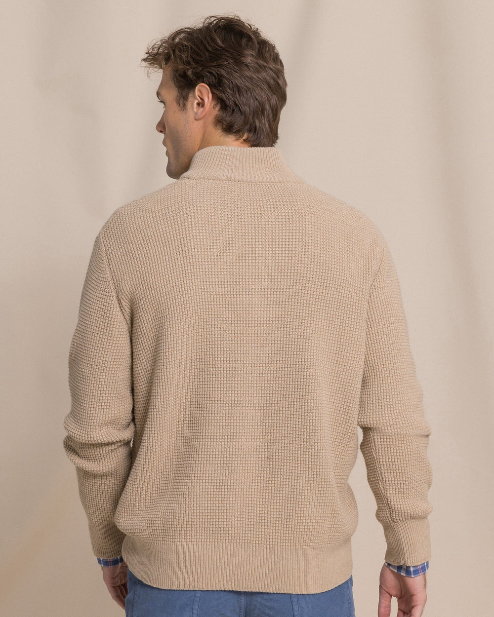 The back view of the Southern Tide Heather Quarter Button Sweater by Southern Tide - Heather Tannin