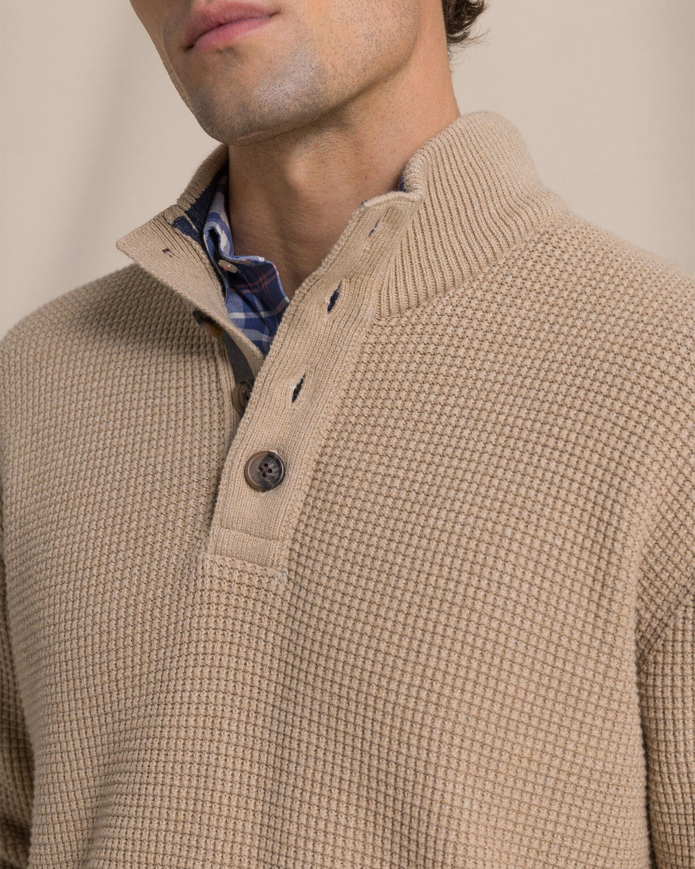 The detail view of the Southern Tide Heather Quarter Button Sweater by Southern Tide - Heather Tannin